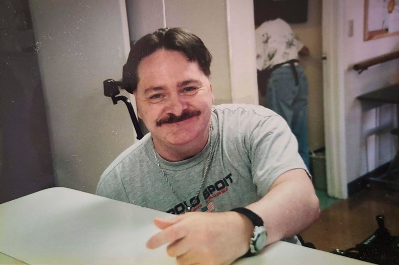 Bradley Fisher in the Bay Area nursing home he entered after bone spurs severed tendons in his spine, partially paralyzing him.