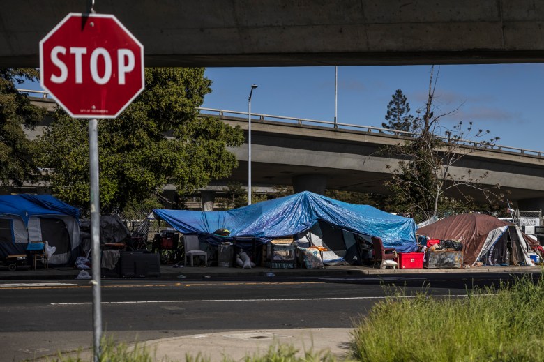 A homeless encampment on W Street and Alhambra Boulevard in Sacramento on April 11, 2023.