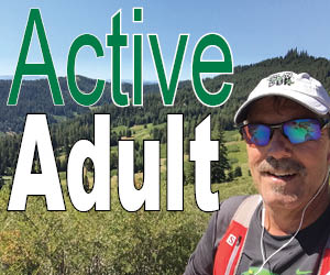 Magazine cover, man hikes in the mountains