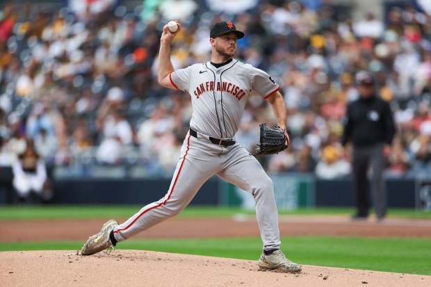 SAN DIEGO, CALIFORNIA - MARCH 31: Daulton Jefferies #56 of the San Francisco Giants throws to the plate in the first inning during a game against the San Diego Padres at PETCO Park on March 31, 2024 in San Diego, California. (Photo by Brandon Sloter/Getty Images)