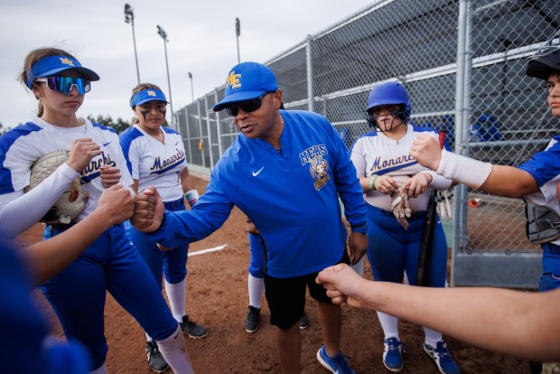 Mt. Eden High School softball head coach Derrick Blue talks to his players between innings during a game against San Leandro High School on Thursday, March 28, 2024, in San Leandro, Calif. Mt. Eden won the game 8-3. (Dai Sugano/Bay Area News Group)between innings