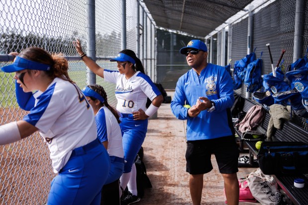 Mt. Eden High School softball head coach Derrick Blue watches the game against San Leandro High School on Thursday, March 28, 2024, in San Leandro, Calif. Mt. Eden won the game 8-3. (Dai Sugano/Bay Area News Group)between innings
