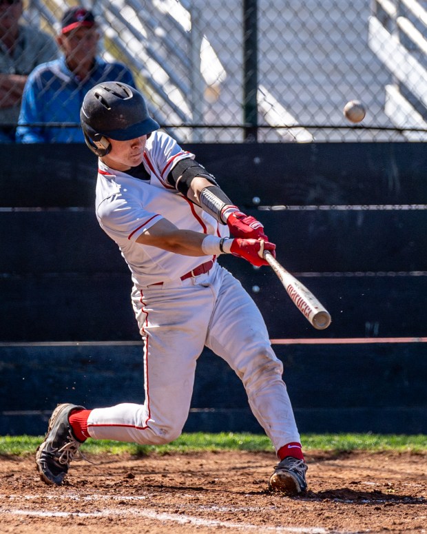 Chico High catcher Cal Stephens hits a single during the Panthers' Eastern Athletic League opener against Red Bluff on Thursday, March 21, 2024 at Skip McDonald Field in Chico, California. (Ben Mota, All Axis Sports/Contributed)