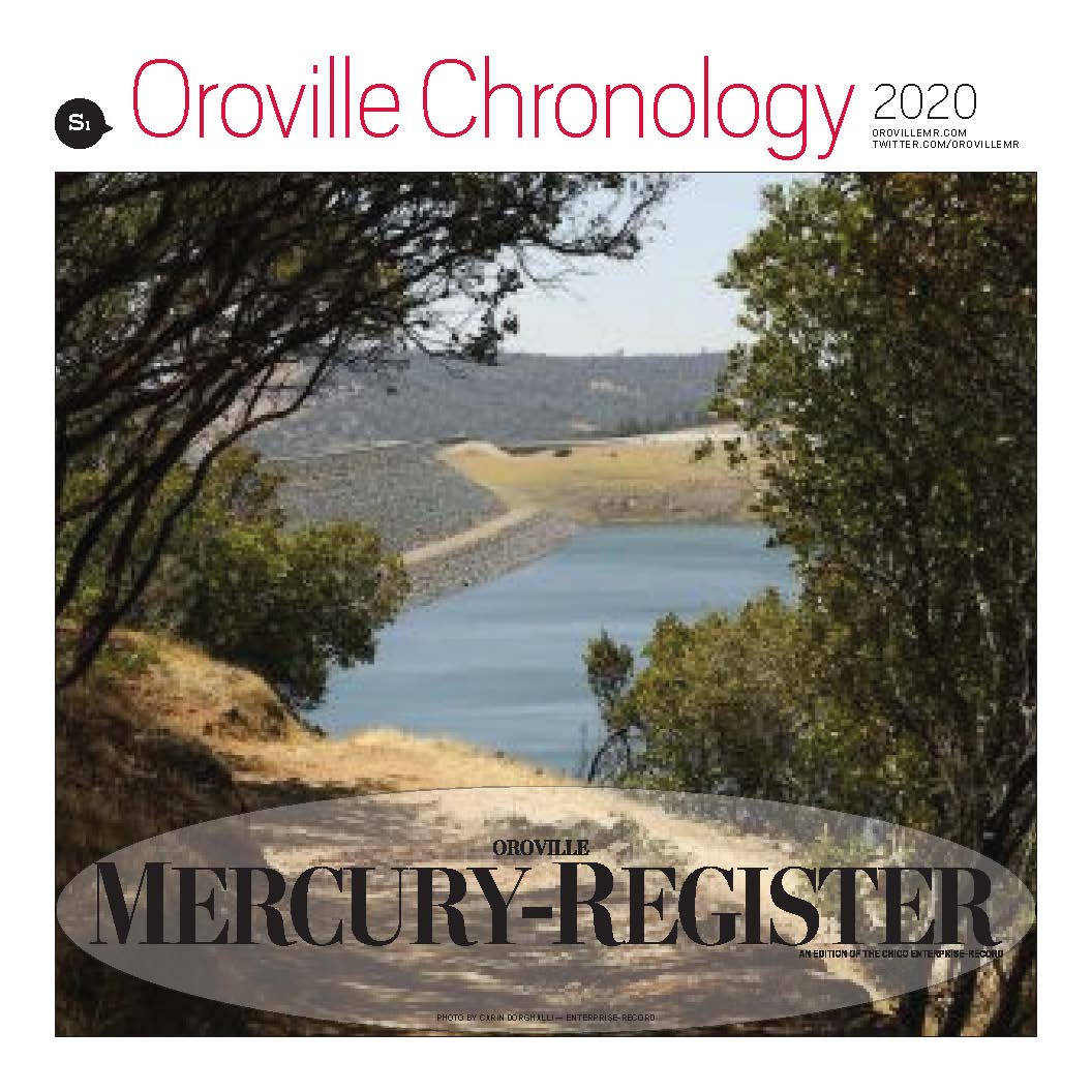 A deer grazes near Lake Oroville in this magazine cover