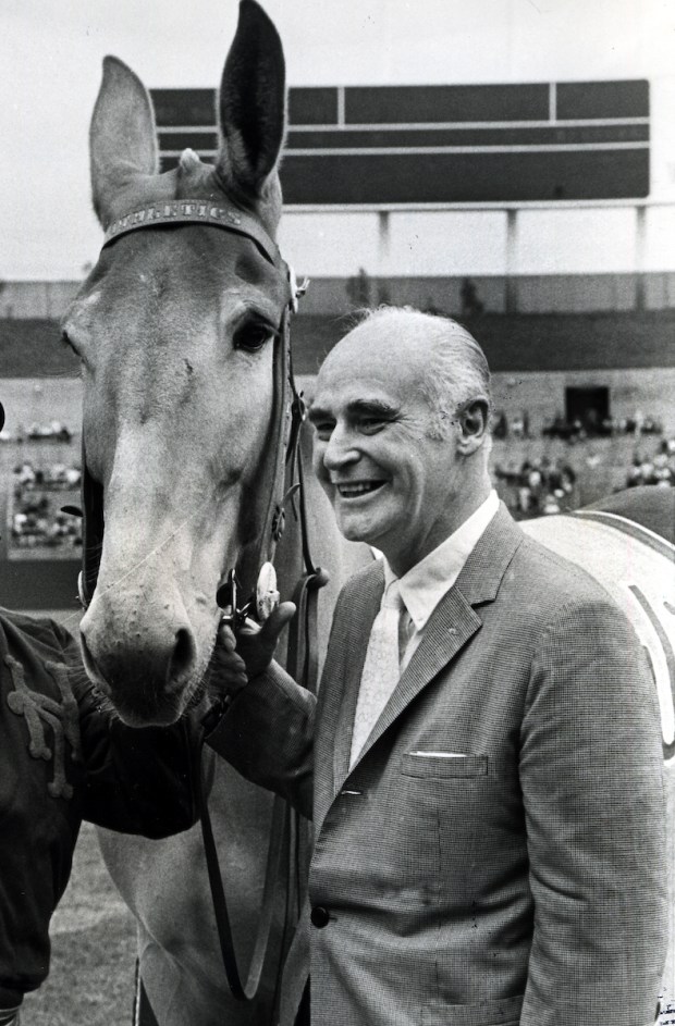 Oakland Athletics owner Charles Finley with his mascot Charlie "O" the mule. (1972 photo by Ron Riesterer)