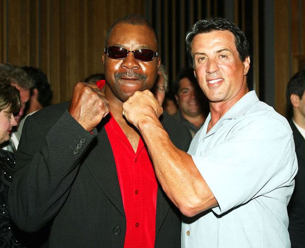 HOLLYWOOD, CA - AUGUST 7: Actors Carl Weathers and Sly Stallone pose at singer Frank Stallone's CD Listening and Release party at Capital Records on August 7, 2003 in Hollywood, California. (Photo by Kevin Winter/Getty Images)