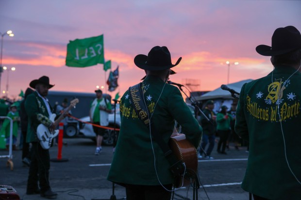 Artilleros del Norte Mexican band perform as Oakland Athletics fans dance during the boycott opening day block party in the parking lot during their MLB opening day game against the Cleveland Guardians at the Coliseum in Oakland, Calif., on Thursday, March 28, 2024. (Ray Chavez/Bay Area News Group)