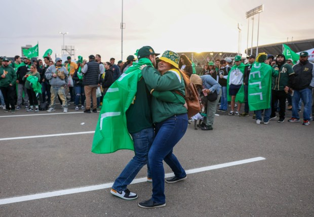 Oakland Athletics fans dance as a Mexican band performs during the boycott opening day block party in the parking lot during their MLB opening day game against the Cleveland Guardians at the Coliseum in Oakland, Calif., on Thursday, March 28, 2024. (Ray Chavez/Bay Area News Group)