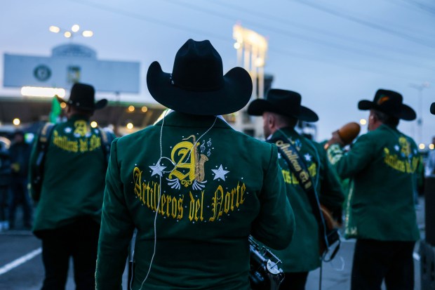 Artilleros del Norte Mexican band perform as Oakland Athletics fans dance during the boycott opening day block party in the parking lot during their MLB opening day game against the Cleveland Guardians at the Coliseum in Oakland, Calif., on Thursday, March 28, 2024. (Ray Chavez/Bay Area News Group)