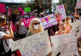 The court that was reshaped by former presidential candidate and Republican Gov. Ron DeSantis ruled 6-1 to uphold the state's ban on most abortions after 15 weeks of pregnancy, meaning a ban on six weeks could soon take effect. But under a separate ruling, the court allowed a ballot measure on abortions rights to go to voters.