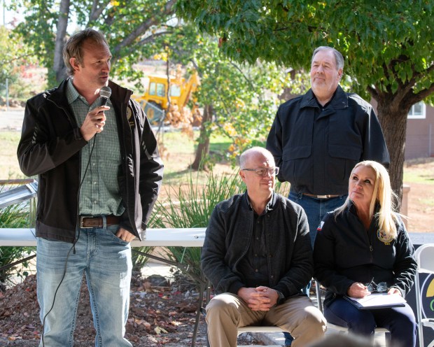 Left to right, Assemblyman James Gallagher speaks beside Camp Fire Collaborative Director Bruce Yerman, Paradise Mayor Greg Bolin, District Representative from Rep. Doug LaMalfa's Office Terrt Dubose during the commemoration of the Camp Fire on Wednesday, Nov. 8, 2023 at Paradise Community Park in Paradise, California. (Michael Weber/Enterprise-Record)