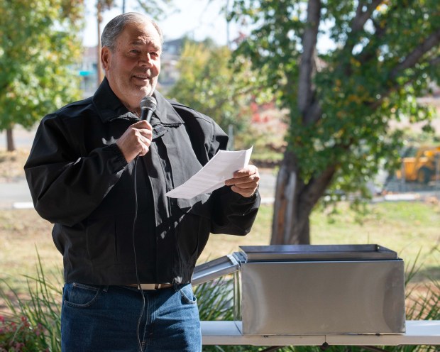 Paradise Mayor Greg Bolin looks up, standing in front of a time capsule, as he delivers a speech to a crowd of Paradisians in remembrance of the Camp Fire on Wednesday, Nov. 8, 2023 in Paradise, California. (Michael Weber/Enterprise-Record)